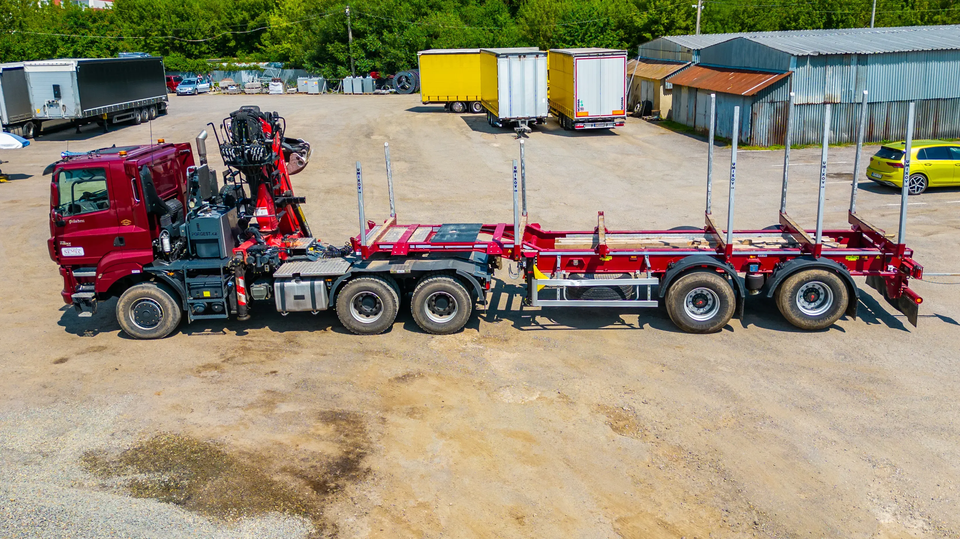 Jazdná súprava - ťahač 6x6 s hydraulickým drapákom + klanicový náves